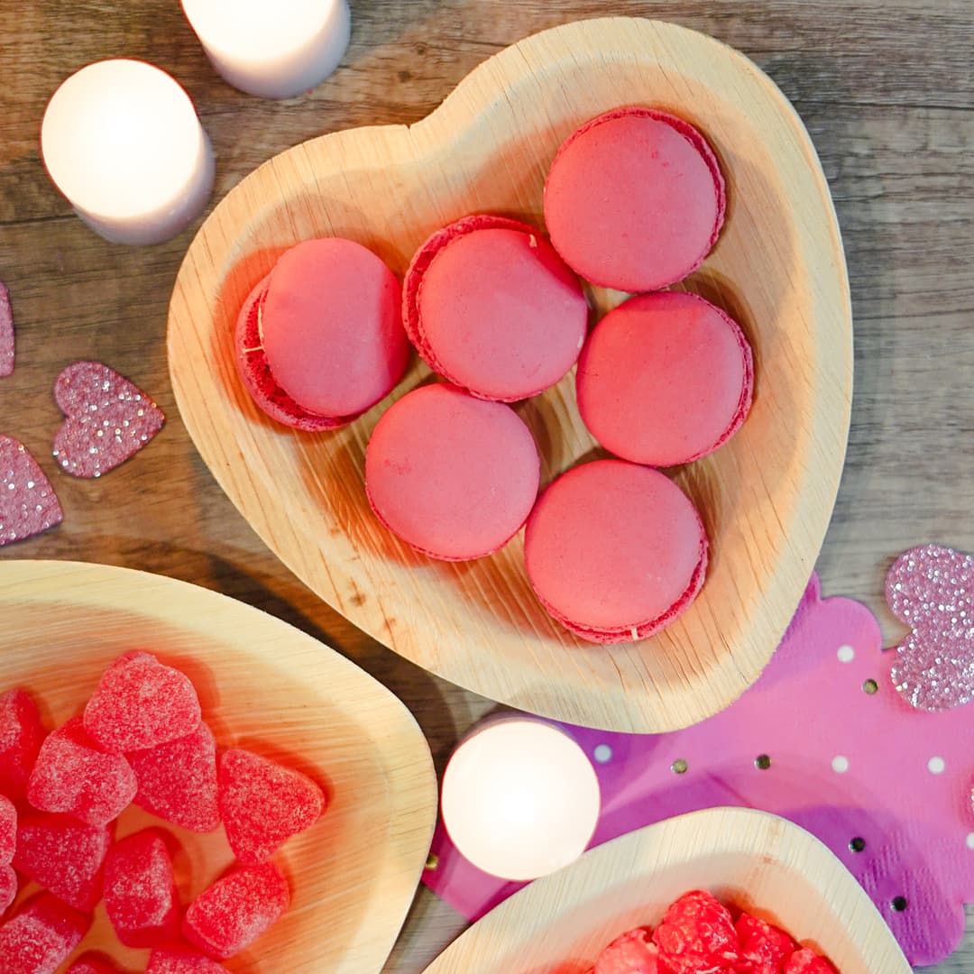 Macarons on heart-shaped plates